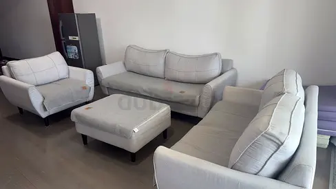 Light grey 3-piece, 6 seater fabric sofa set with ottoman - excellent condition