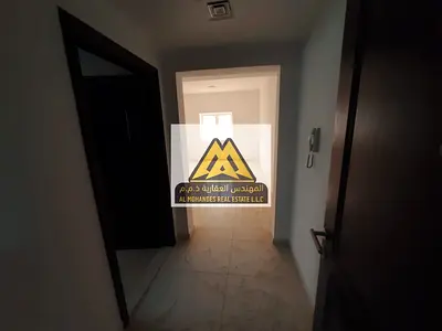Annual Rent Apartment in Al Naeemiya 2, Ajman – 1 Bedroom + Living Room, Spacious Layout, Bathroom, Built-in Cabinets, Central AC on Main Street