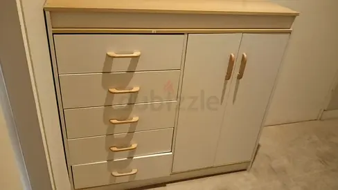 Light wood chest of drawers with side cupboard - good condition