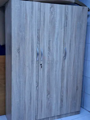 I want to sell this three door cabinet for wooden for sale