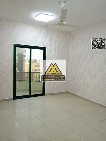 شقة غرفتين في أبراج الراشدية عجمان، مساحة واسعة، بلكونة، 2 حمام. 40,000 درهم سنويًا، 4 دفعات، موقع مميز قريب من الخدمات.