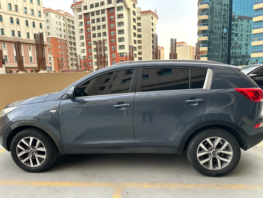 Kia Sportage 2015 — photo 1 of 5