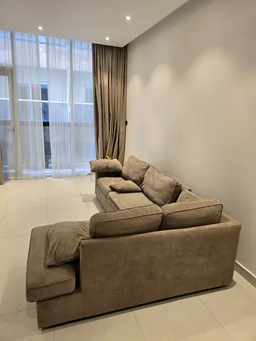 Home center sofa Comfortable L-shaped Fabric Sofa — Neutral Beige, Good Condition