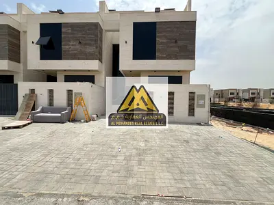 فيلا تاون هاوس للبيع في الحليو 2 عجمان 5 غرف ماستر واجهة حجر روف بسعر 1400000 شامل الرسوم