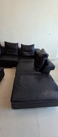 Black L-shaped leather sofa with chaise - good condition