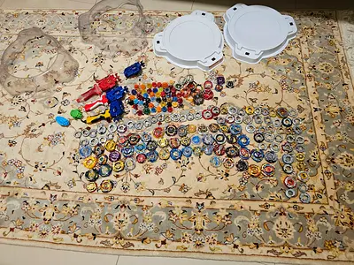 Large Beyblade Burst Collection with Beystadium and Launchers some are real some are fake