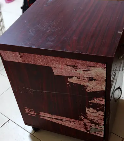Used wooden bedside cabinet / nightstand - worn veneer
