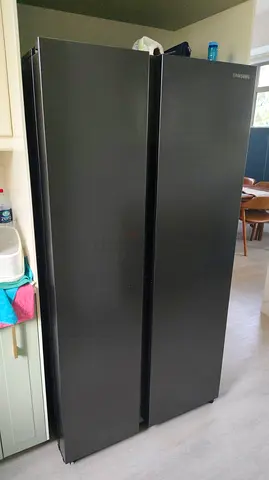 Samsung side by side fridge freezer same like new condition perfect working price 2500