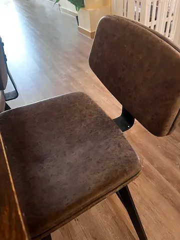 Steel and wooden table and stools