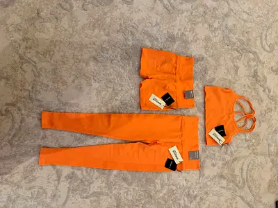Orange matching workout set — sports bra, leggings and shorts (new with tags)