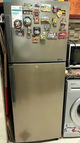 Used stainless steel double-door refrigerator - good working condition