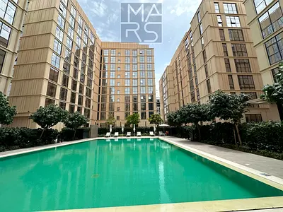 A one-bedroom apartment is available for rent in a prestigious compound, offering comfort and privacy, for AED 47,000 per year.