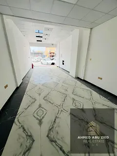 Spacious 400 Sqft Shop for Annual Rent in Al Mowaihat 2 | Main Road Location | 1 Month Free | Suitab