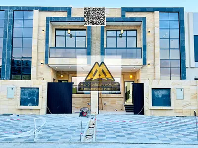 A brand-new villa for annual rent in Al Helio 2 – Ajman, located on a main road with a large setback. It offers spacious interiors and a practical lay