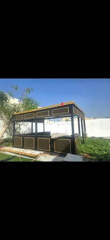 Outdoor gazebo / majlis seating structure - sturdy metal frame with panels