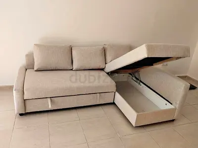 Beige L-shaped Sofa Bed with Storage - Good Condition