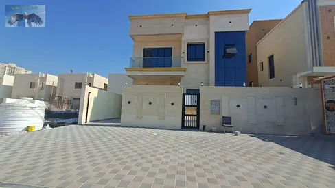 Very luxurious villa, first tenant, for annual rent in Ajman, located in a quiet upscale area, close to all services with easy access to Dubai and Sha
