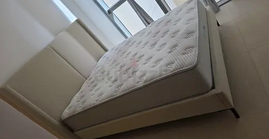 Queen fabric bed frame with mattress — good condition