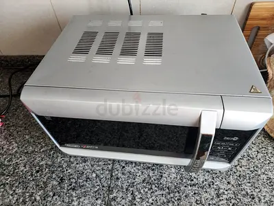 Used Sharp Carousel Microwave Oven - Good Working Condition