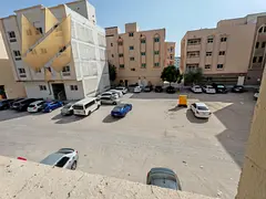 Studio apartment for rent in Old Muwailih, close to schools, with a separate kitchen.
