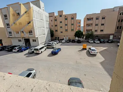 Studio apartment for rent in Old Muwailih, close to schools, with a separate kitchen.