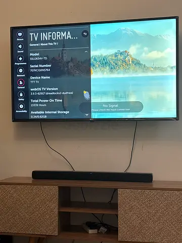 LG 55-inch LED Smart TV (mounted) with soundbar - good working condition