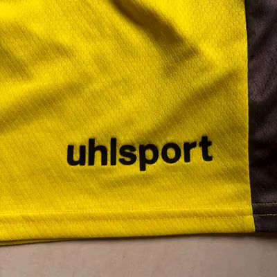 uhlsport yellow athletic shorts (sportswear) - size L,