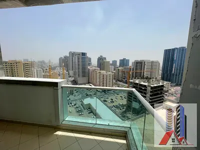 “For Sale: 2-Bedroom Empty Flat in Ajman One Tower – Closed Kitchen, Parking, and Open View”