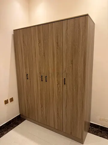 Wood-effect 4-door Wardrobe in excellent condition
