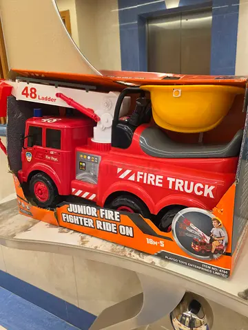 Kids Ride-On Fire Truck + Helmet - Junior Fire Fighter Toy. New. Unused. AED 295 Only. Free Delivery