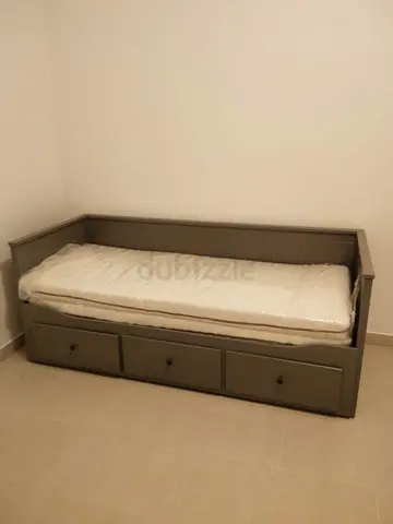 IKEA hamnes day bed with 3 big storage drawers underneath and with 2 IKEA mattresses is available