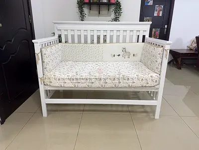 White Wooden Baby Crib with Bumper and Mattress - Good Condition