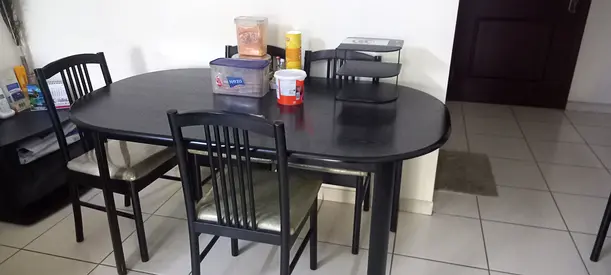 Dining table with 6 chairs in immaculate condition for sale