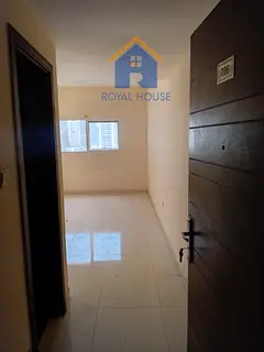 For rent in Sharjah - Al Qasba Two-bedroom apartment + living room Prime location close to all servi