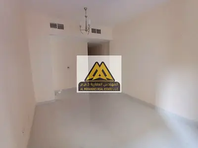One-bedroom apartment for rent in Al Rawda 2, Sheikh Ammar Street, with a spacious layout and central air conditioning.