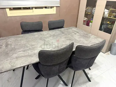 Pan home dining table with 4 chairs.