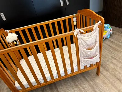 Baby cot bed with mattress from MOTHERCARE