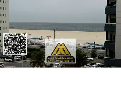 1BR sea view apt Al Nakhil 1 Ajman, 2nd row Corniche. Balcony, 2 baths, central AC. AED 30,000 yearly, 4 payments, spacious.