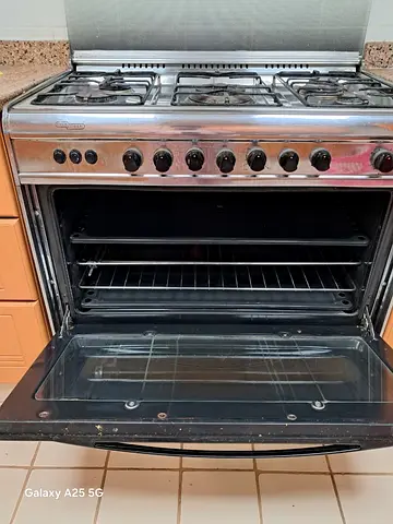 Used freestanding gas cooker with oven - 5 burners, stainless steel