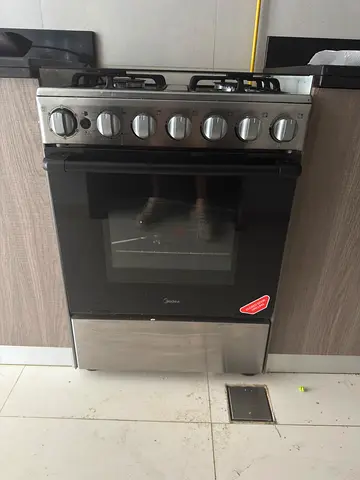 Midea 4-Burner Gas Cooker with Oven — Good Condition