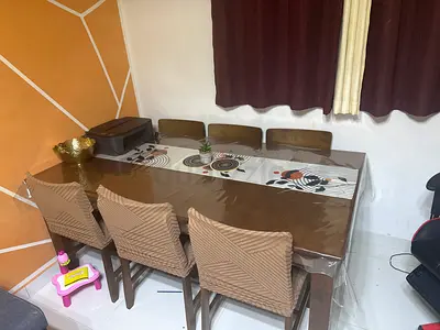 Solid Wood 6-Seater Dining Table with Cushioned Chairs (Good Condition)