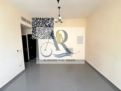 Studio for rent in Al Alia. Separate kitchen, central AC, spacious. Prime location near services & Sheikh Mohammed Bin Zayed Road. AED 20,000.