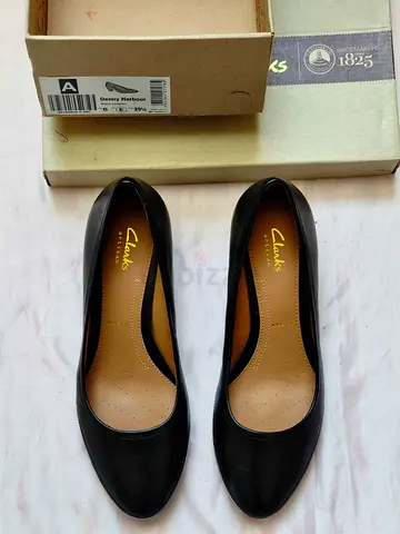 Clarks short heels real leather new shoes size 8 for 150 AED.