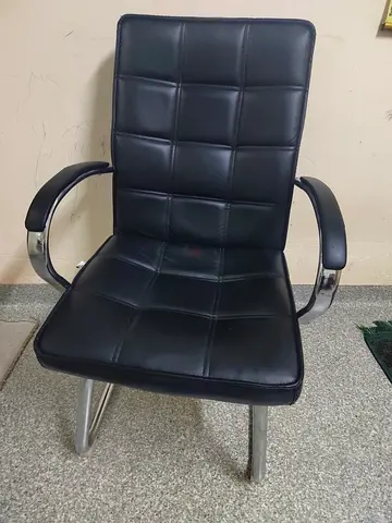 Black Faux Leather Office Visitor Chair with Padded Back and Chrome Frame