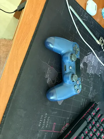 Used Wireless with slight stuck drift DualShock 4 Controller (Blue) for PS4 - Good Condition