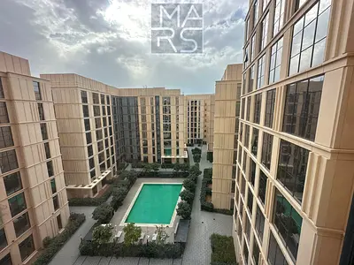 A one-bedroom apartment is available for rent in a prestigious compound, offering comfort and privacy, for AED 43,000 per year.