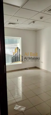 Office for rent in Al Qasba, area 762 sq. ft., three rooms and a reception with a bathroom and pantry. Office building...........................