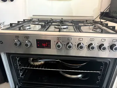 Stainless Steel 5-Burner Gas Cooker with Oven - Good Condition WITH GAS cylinder