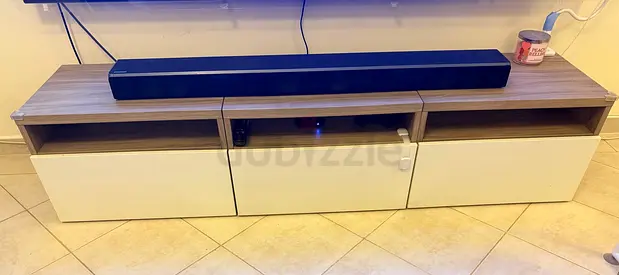 Low-profile TV cabinet with storage drawers - light wood  white