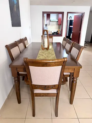 Solid Wood 8-Seater Dining Table with Upholstered Chairs - Good Condition